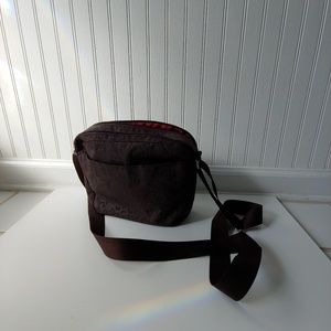 Baggalini cheetah messenger purse